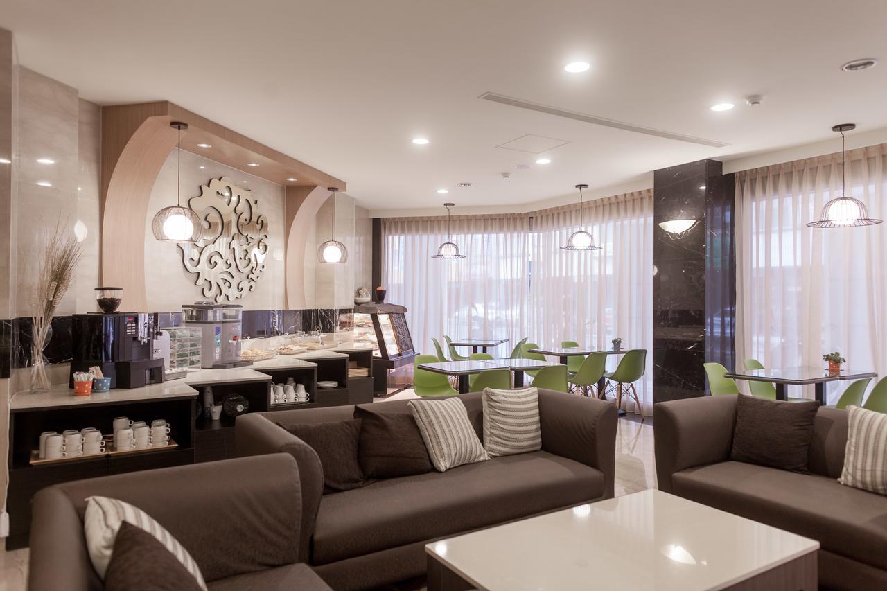 טאינאן Maple Hotel מראה חיצוני תמונה